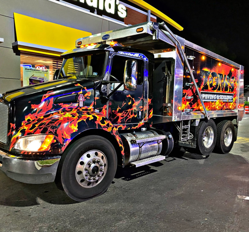 Toms Paving flame dump truck