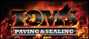 Toms Paving and Sealing logo with flames
